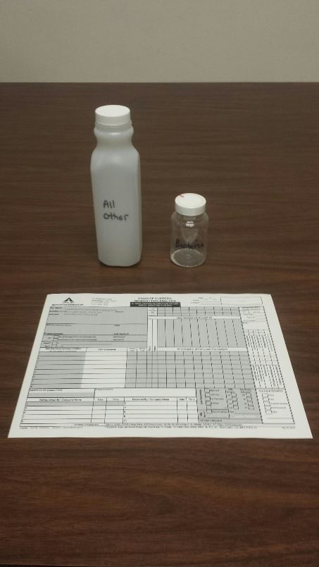 Image of water test bottles and chain of custody document for the water testing service