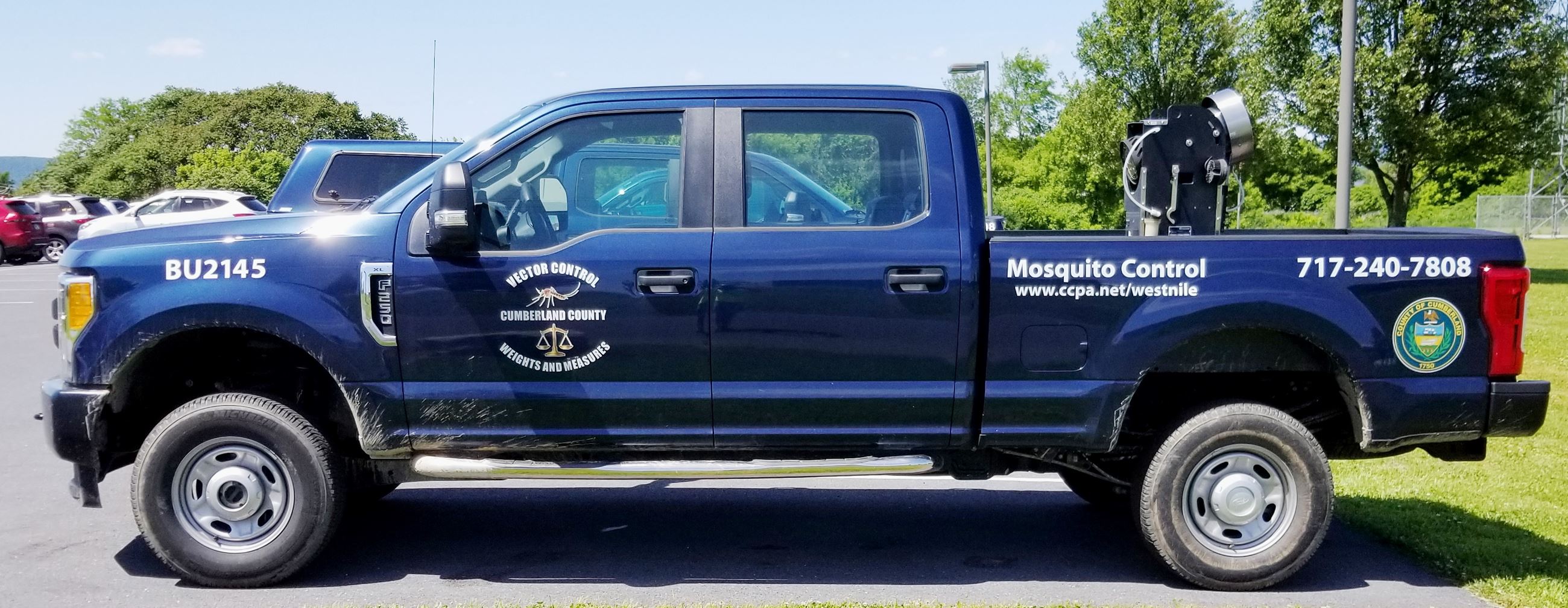Vector Control's blue 2019 pickup truck, used for mosquito control