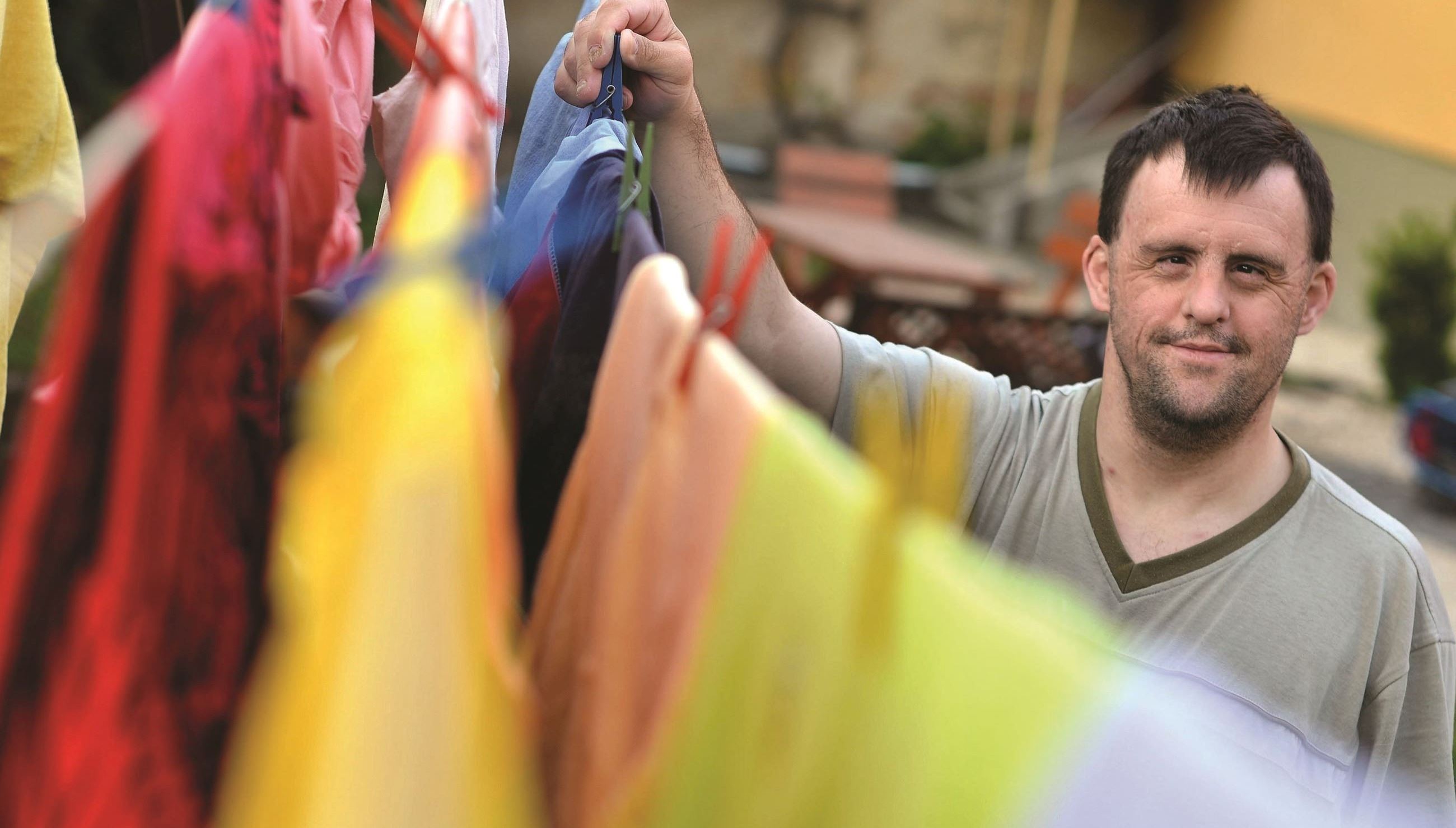 Man hanging up laundry